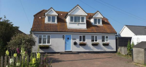 3-Bedroom Family Home. Just 5 Mins From The Beach!